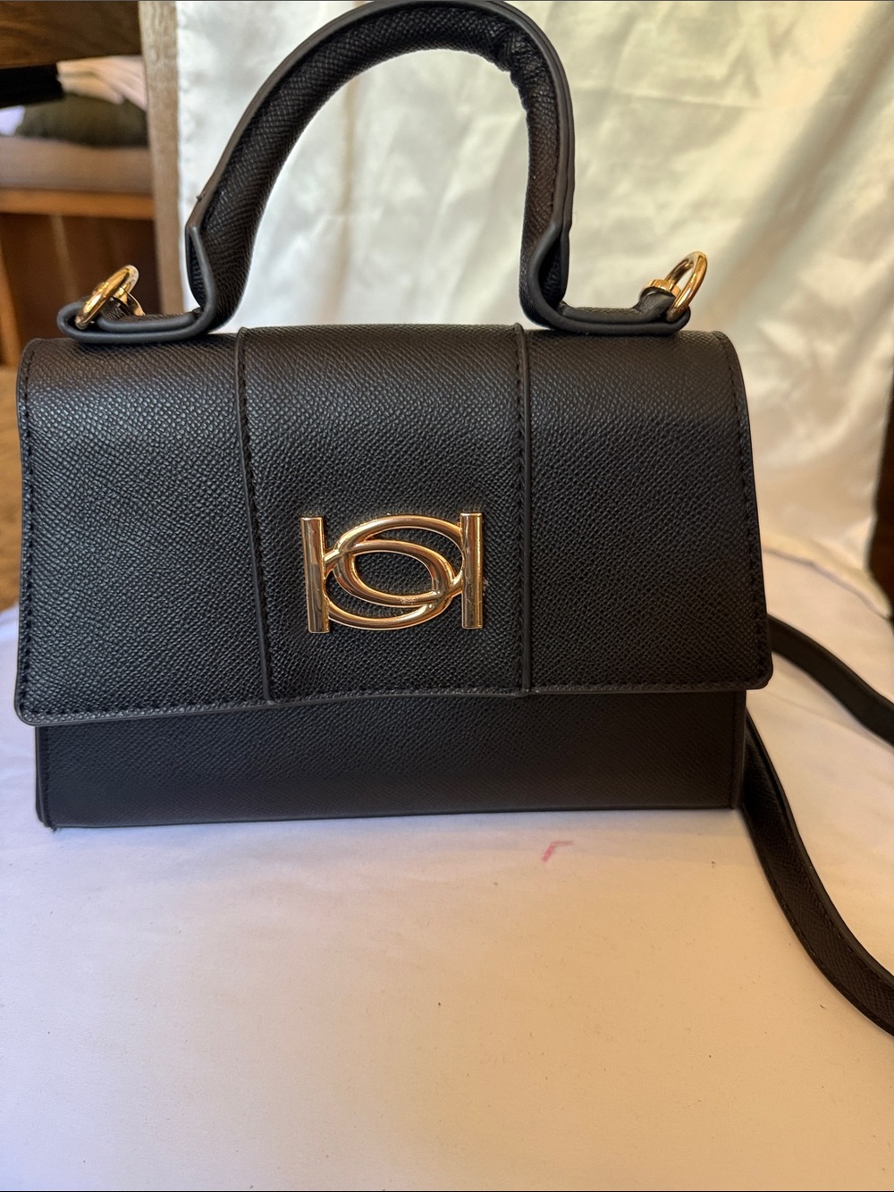 Bebe Small Black Top-Handle Women's Bag with Gold Accent crossbody or handle